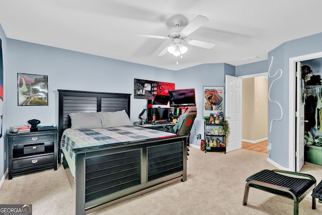 carpeted bedroom featuring baseboards, ceiling fan, and a closet