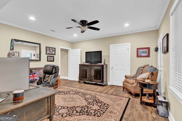 home office featuring wood finished floors, a ceiling fan, crown molding, recessed lighting, and baseboards