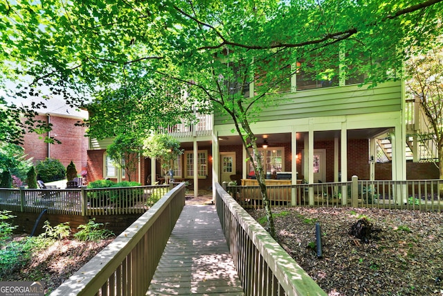 1477 Edenham Ln, Cumming, GA 30041 - rear view of house featuring brick siding