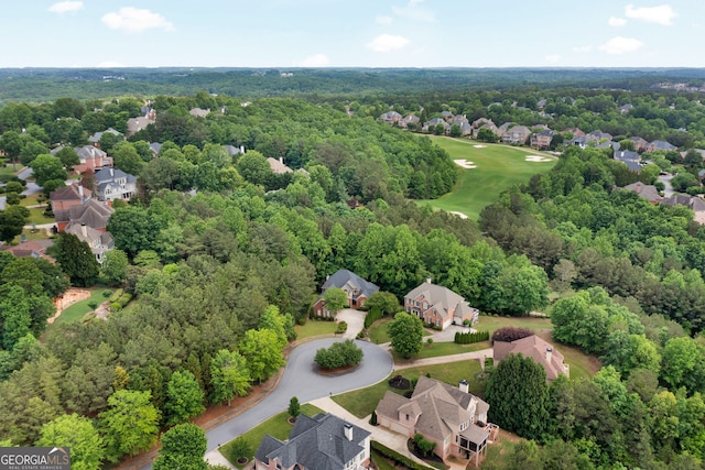aerial view of residential area with a golf course