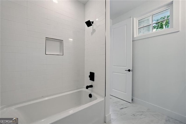 2150 Tidwell Ln Unit 5, Atlanta, GA 30318 - bathroom featuring marble finish flooring, baseboards, and shower / bath combination