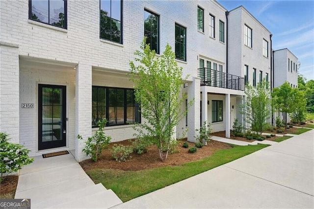 2150 Tidwell Ln Unit 5, Atlanta, GA 30318 - view of exterior entry featuring brick siding