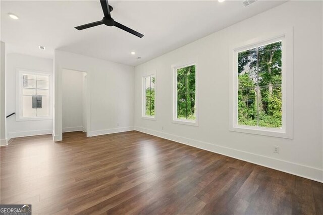 2150 Tidwell Ln Unit 5, Atlanta, GA 30318 - unfurnished bedroom featuring baseboards, dark wood-style flooring, recessed lighting, and a ceiling fan