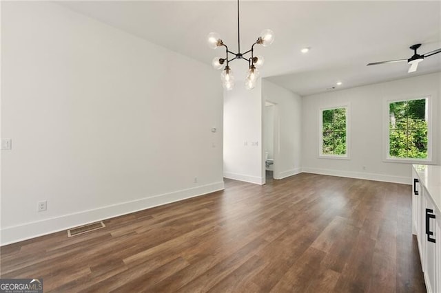 2150 Tidwell Ln Unit 5, Atlanta, GA 30318 - unfurnished dining area featuring dark wood finished floors, baseboards, and a chandelier