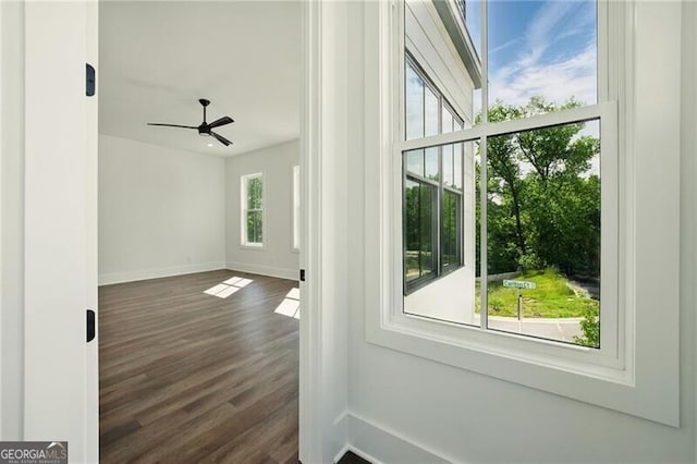 2150 Tidwell Ln Unit 5, Atlanta, GA 30318 - doorway featuring dark wood finished floors, baseboards, and ceiling fan