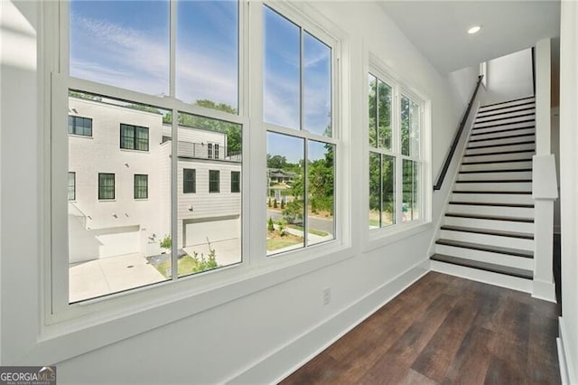 2150 Tidwell Ln Unit 5, Atlanta, GA 30318 - doorway to outside with healthy amount of natural light, baseboards, dark wood-style floors, stairs, and recessed lighting