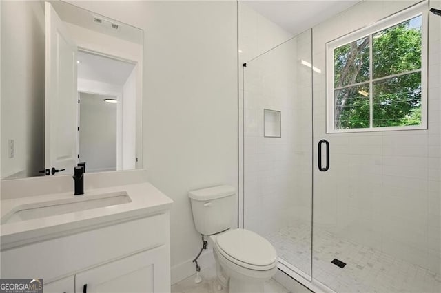 2150 Tidwell Ln Unit 5, Atlanta, GA 30318 - full bathroom featuring toilet, a shower stall, vanity, and baseboards