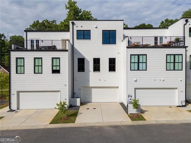 2150 Tidwell Ln Unit 5, Atlanta, GA 30318 - view of property with a balcony and a garage
