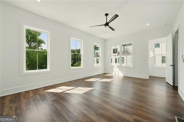 2150 Tidwell Ln Unit 5, Atlanta, GA 30318 - unfurnished living room featuring a ceiling fan, dark wood-type flooring, baseboards, and recessed lighting