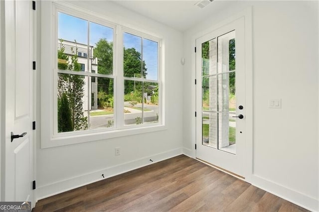 2150 Tidwell Ln Unit 5, Atlanta, GA 30318 - doorway to outside with dark wood-type flooring and baseboards