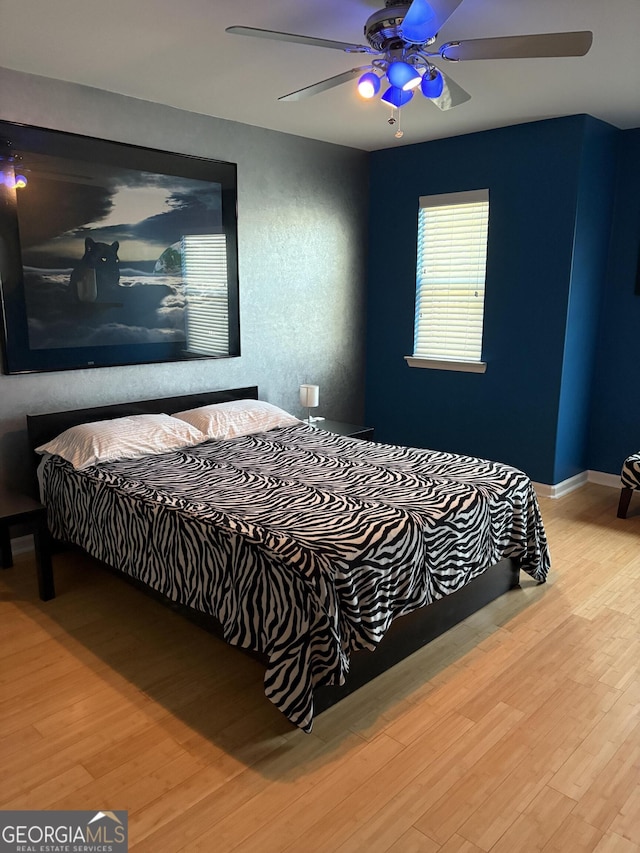 124 Somersby Blvd, Pooler, GA 31322 - bedroom featuring wood finished floors and a ceiling fan