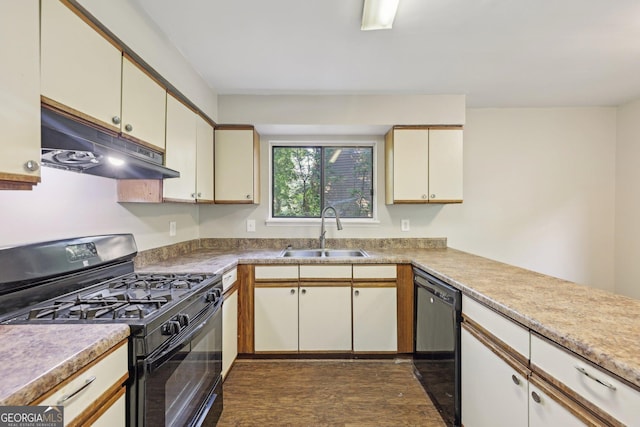 5362 Kelleys Mill Cir, Stone Mountain, GA 30088 - kitchen with black appliances, a sink, under cabinet range hood, and light countertops