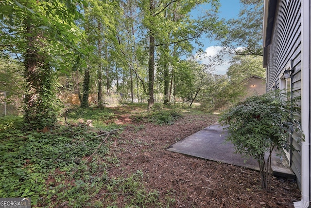 5362 Kelleys Mill Cir, Stone Mountain, GA 30088 - view of yard featuring a patio
