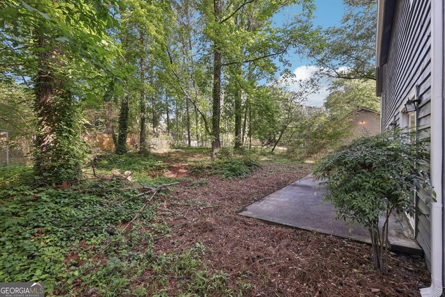 5362 Kelleys Mill Cir, Stone Mountain, GA 30088 - view of yard with a patio area