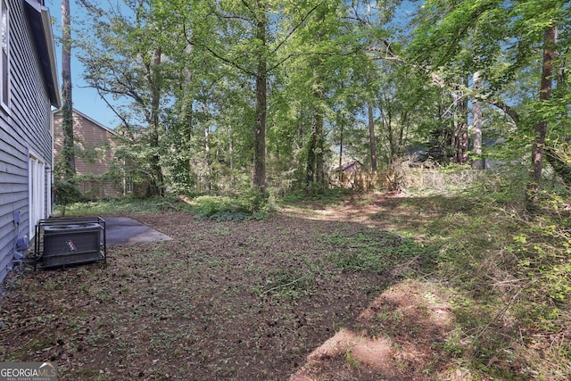 5362 Kelleys Mill Cir, Stone Mountain, GA 30088 - view of yard with central AC unit