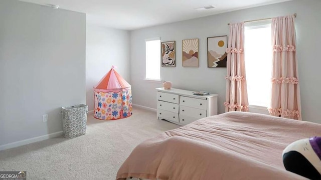 20 Geranium Ln, Covington, GA 30016 - carpeted bedroom with baseboards