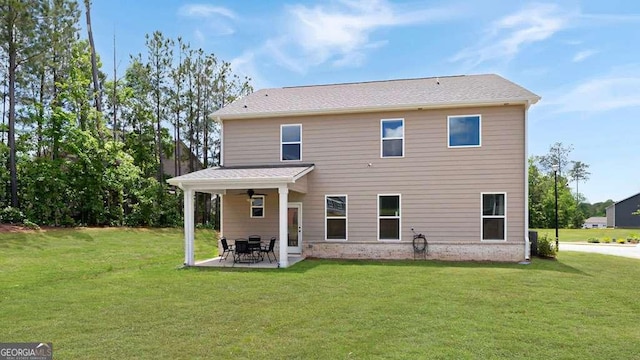 20 Geranium Ln, Covington, GA 30016 - back of house with ceiling fan, a yard, and a patio