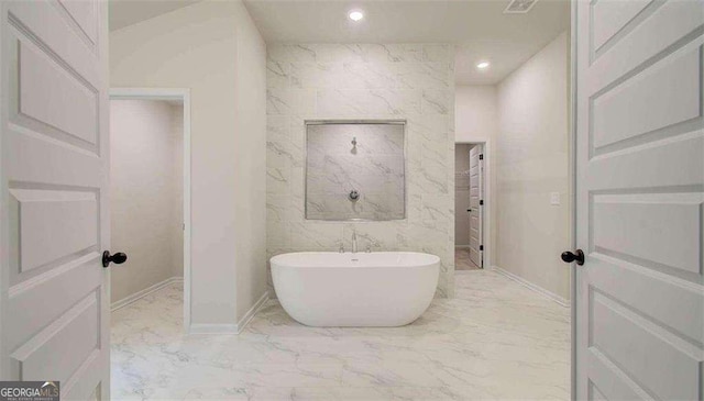120 Cooper Cv W Lot 60, Fayetteville, GA 30214 - bathroom with marble finish flooring, a freestanding bath, and recessed lighting