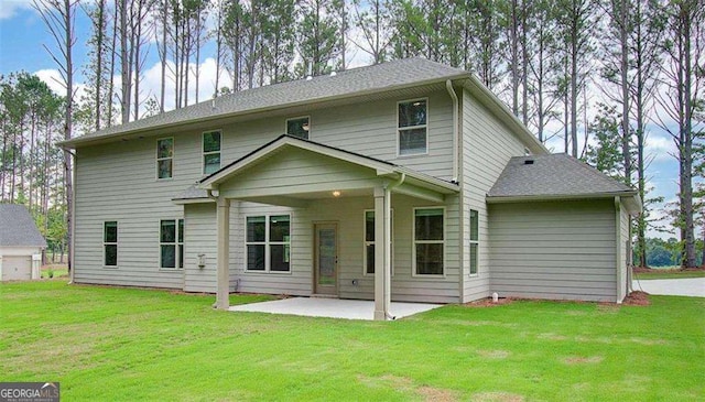 120 Cooper Cv W Lot 60, Fayetteville, GA 30214 - rear view of house featuring a patio and a lawn