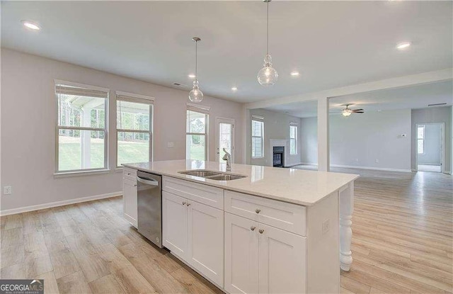 160 Cooper Cv W Lot 64, Fayetteville, GA 30215 - kitchen with dishwasher, open floor plan, light wood-style floors, white cabinetry, and recessed lighting