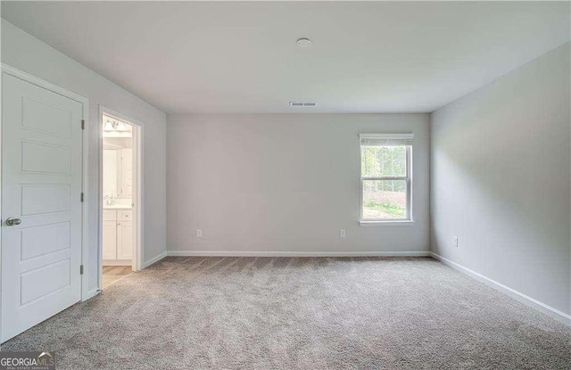160 Cooper Cv W Lot 64, Fayetteville, GA 30215 - spare room featuring light carpet and baseboards
