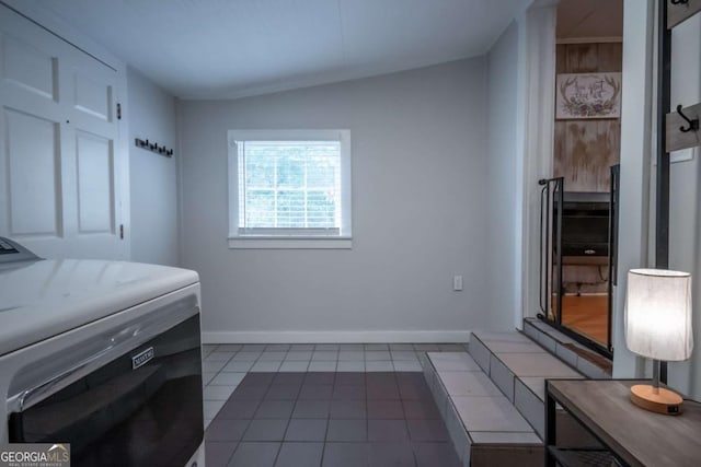 180 Cross St, Maysville, GA 30558 - tiled bedroom with washer / dryer and baseboards