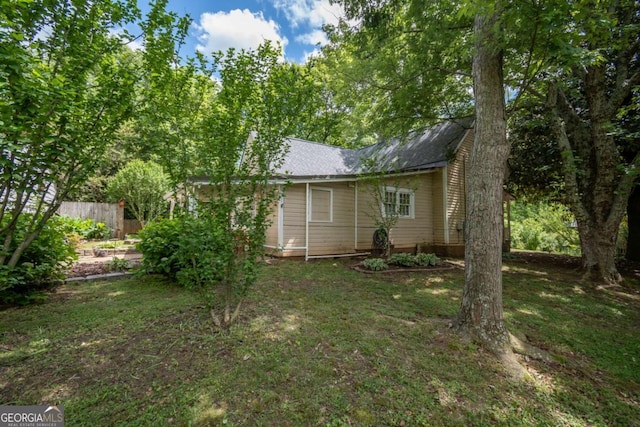 180 Cross St, Maysville, GA 30558 - back of property with fence and roof with shingles
