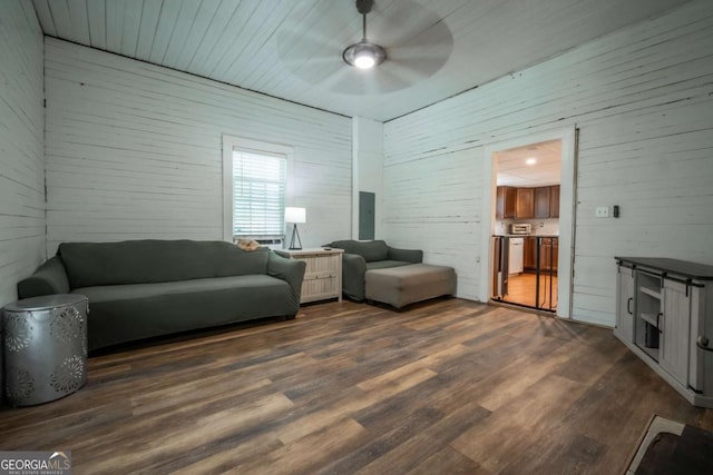 180 Cross St, Maysville, GA 30558 - living area featuring ceiling fan and dark wood-style flooring