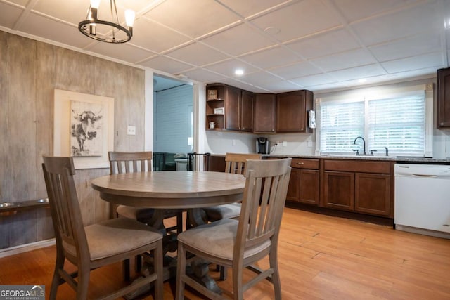 180 Cross St, Maysville, GA 30558 - dining room with light wood-style floors, a chandelier, recessed lighting, and wood walls
