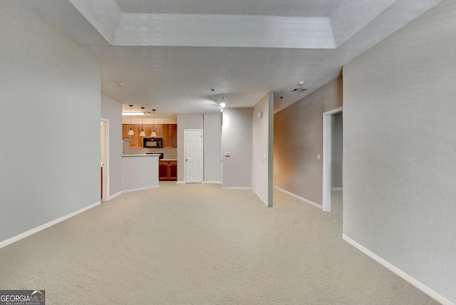 3500 Sweetwater Rd Unit 522, Duluth, GA 30096 - unfurnished living room with baseboards and light colored carpet