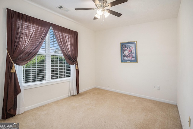 807 Ideal Pl, Winder, GA 30680 - carpeted spare room with ceiling fan and baseboards