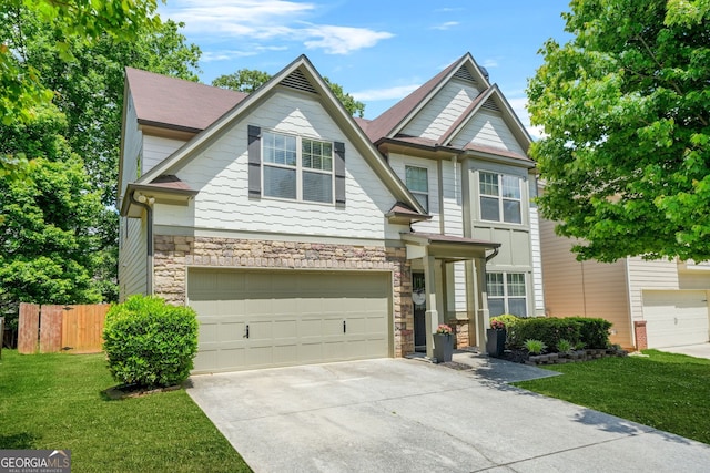 1326 Castleberry Dr, Buford, GA 30518 - craftsman-style house featuring driveway, stone siding, and a garage
