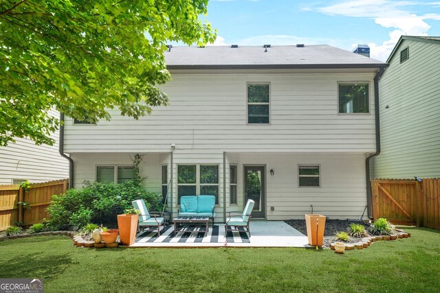 1326 Castleberry Dr, Buford, GA 30518 - back of property with outdoor lounge area, a patio area, and a gate