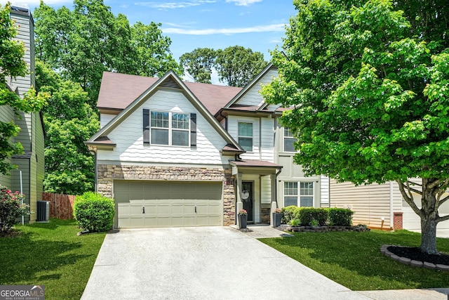 1326 Castleberry Dr, Buford, GA 30518 - view of front of house with stone siding, concrete driveway, a garage, a front yard, and central AC unit