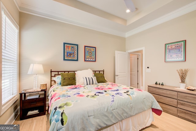 bedroom with light wood-style flooring, crown molding, and recessed lighting
