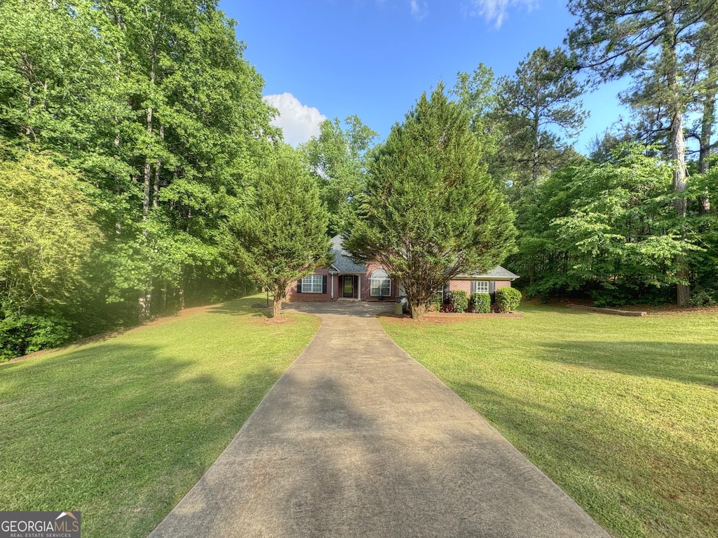 239 Old Pond Rd, Lagrange, GA 30241 - view of front facade with driveway and a front lawn