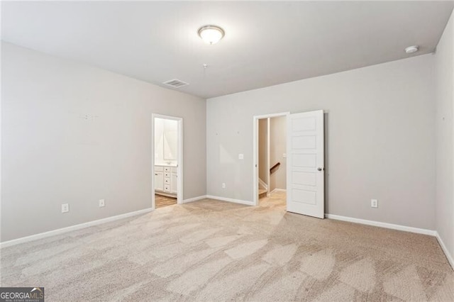 2111 Wesson Ct, Kennesaw, GA 30144 - unfurnished bedroom featuring carpet floors, baseboards, and ensuite bathroom