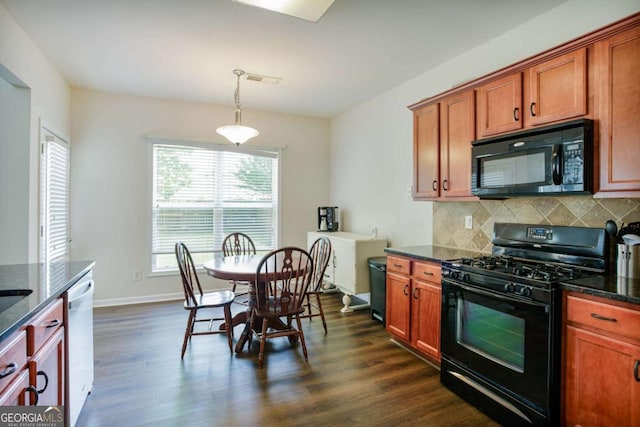 5730 Weddington Dr, Cumming, GA 30040 - kitchen with black appliances, backsplash, dark wood-type flooring, and dark stone counters