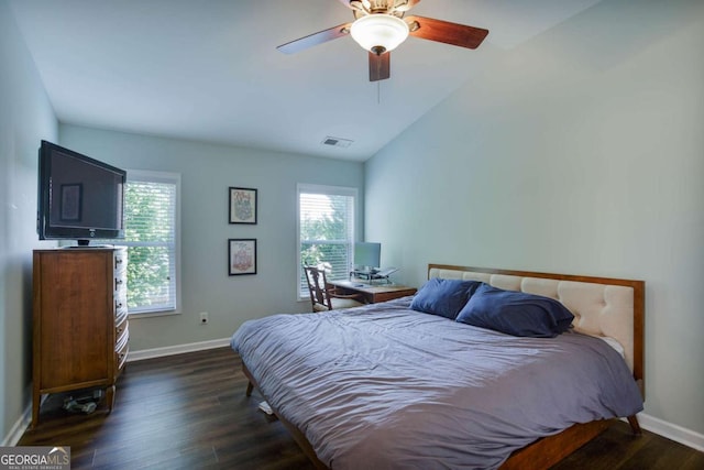 5730 Weddington Dr, Cumming, GA 30040 - bedroom with dark wood-style floors, vaulted ceiling, and a ceiling fan