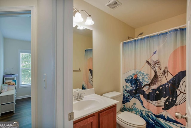 5730 Weddington Dr, Cumming, GA 30040 - full bathroom with vanity, wood finished floors, and a shower with curtain