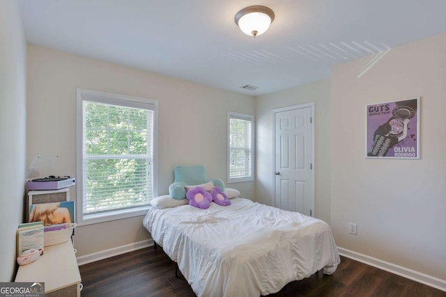 5730 Weddington Dr, Cumming, GA 30040 - bedroom featuring multiple windows and dark wood-style floors