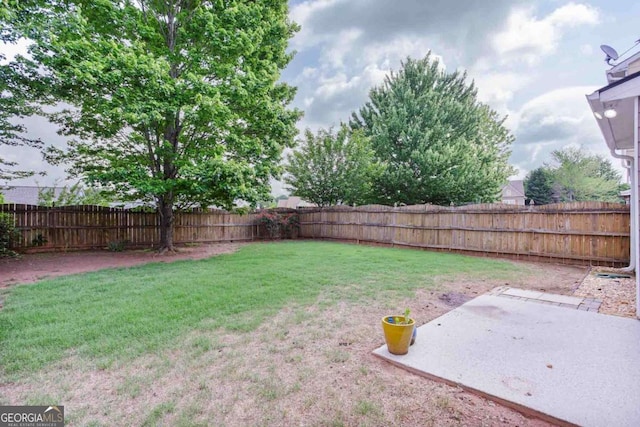 5730 Weddington Dr, Cumming, GA 30040 - fenced backyard featuring a patio area