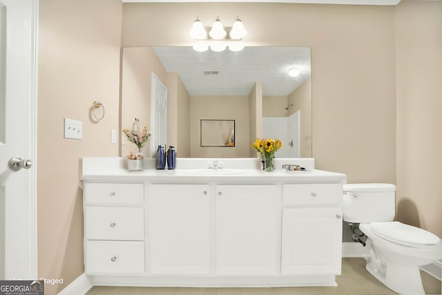 132 Tara Commons Dr, Loganville, GA 30052 - bathroom with vanity, toilet, and baseboards