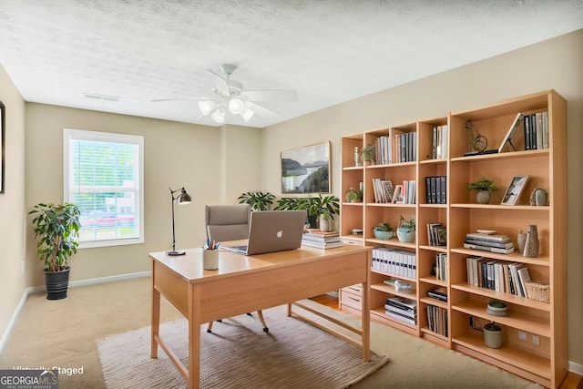 132 Tara Commons Dr, Loganville, GA 30052 - home office with carpet, a ceiling fan, and baseboards