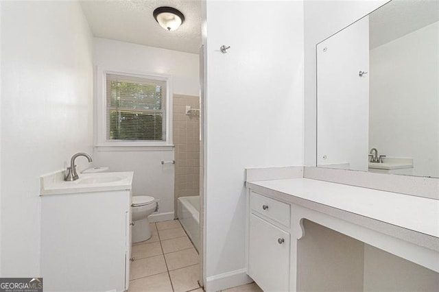 full bathroom with vanity, toilet, and tile patterned flooring