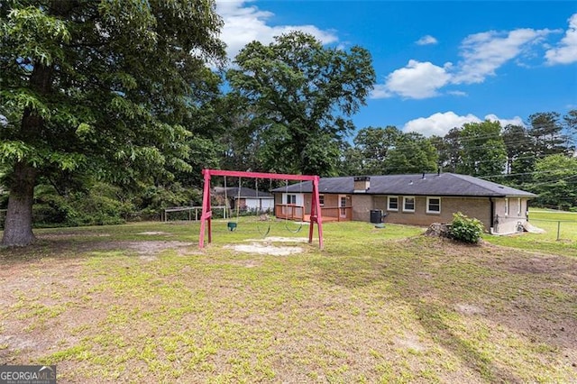 view of yard featuring a playground