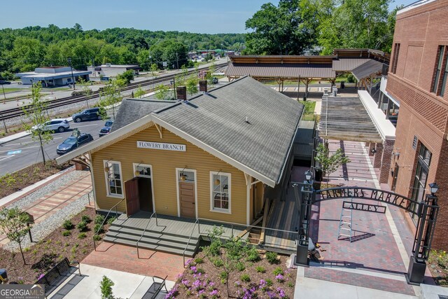 5583 Spring St, Flowery Branch, GA 30542 - view of front of house with a shingled roof
