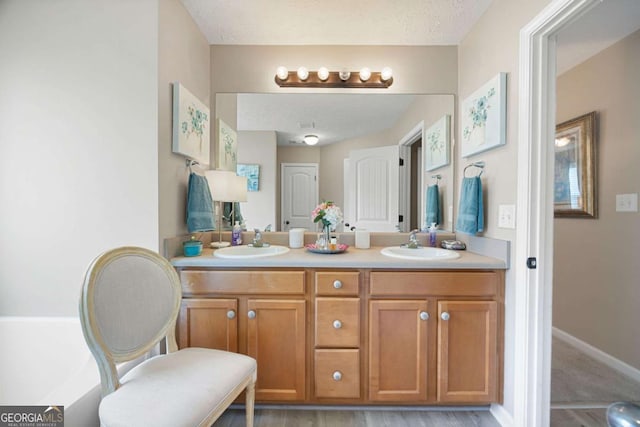 102 Autumn Brooke Trl, Dallas, GA 30157 - bathroom with double vanity and wood finished floors