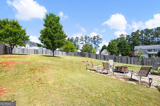 102 Autumn Brooke Trl, Dallas, GA 30157 - fenced backyard with an outdoor fire pit and a patio