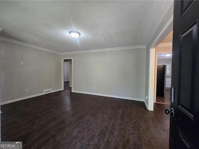 767 Vinson Pl SW, Atlanta, GA 30315 - empty room with dark wood-type flooring, baseboards, crown molding, and a textured ceiling
